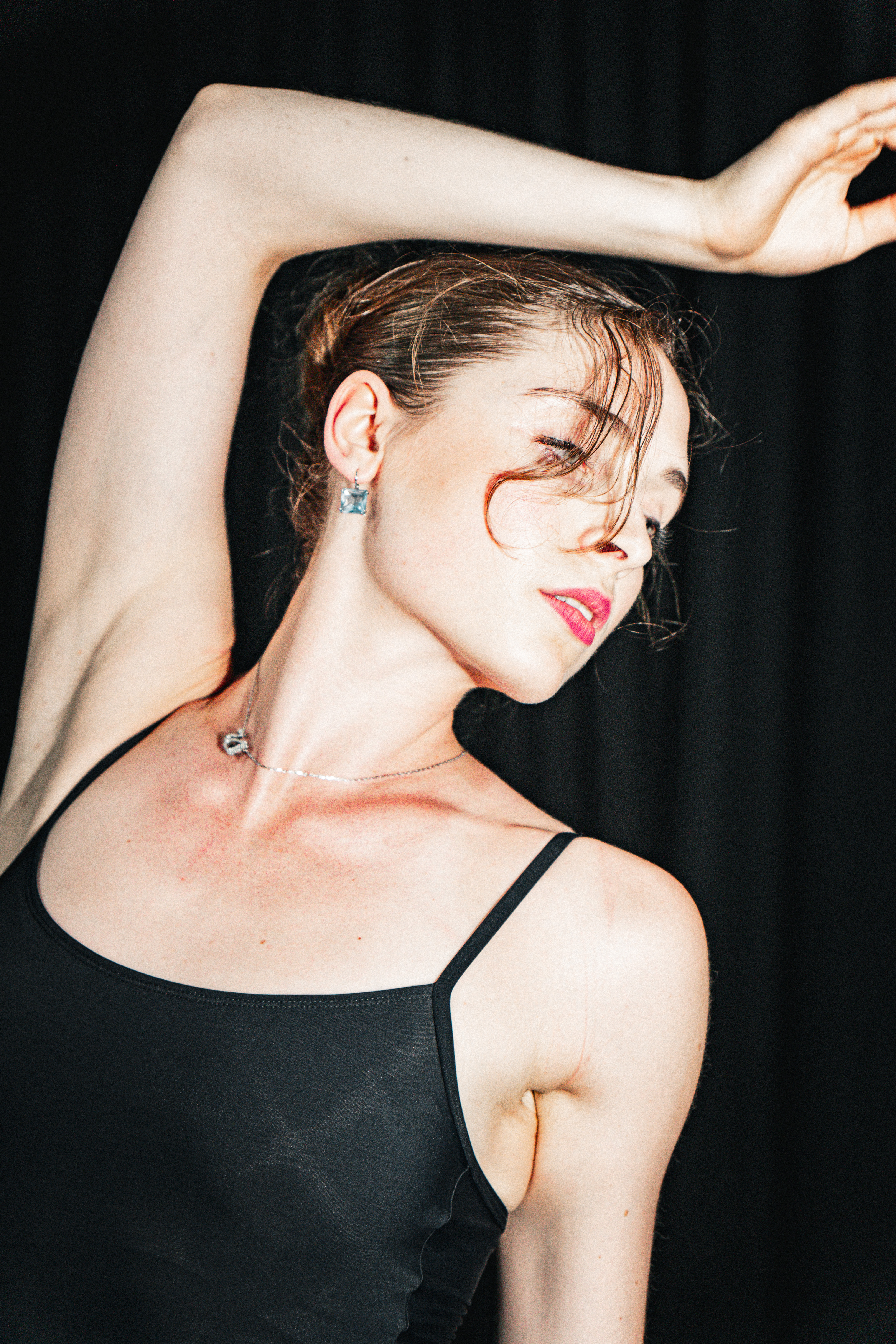 Portrait of Hannah with one arm raised