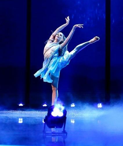 Hannah Martin performing on stage